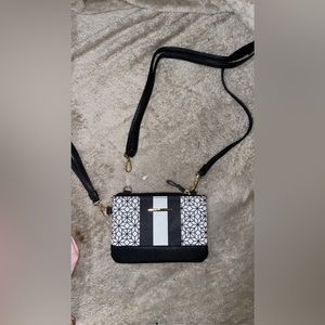 Wristlet/cross body